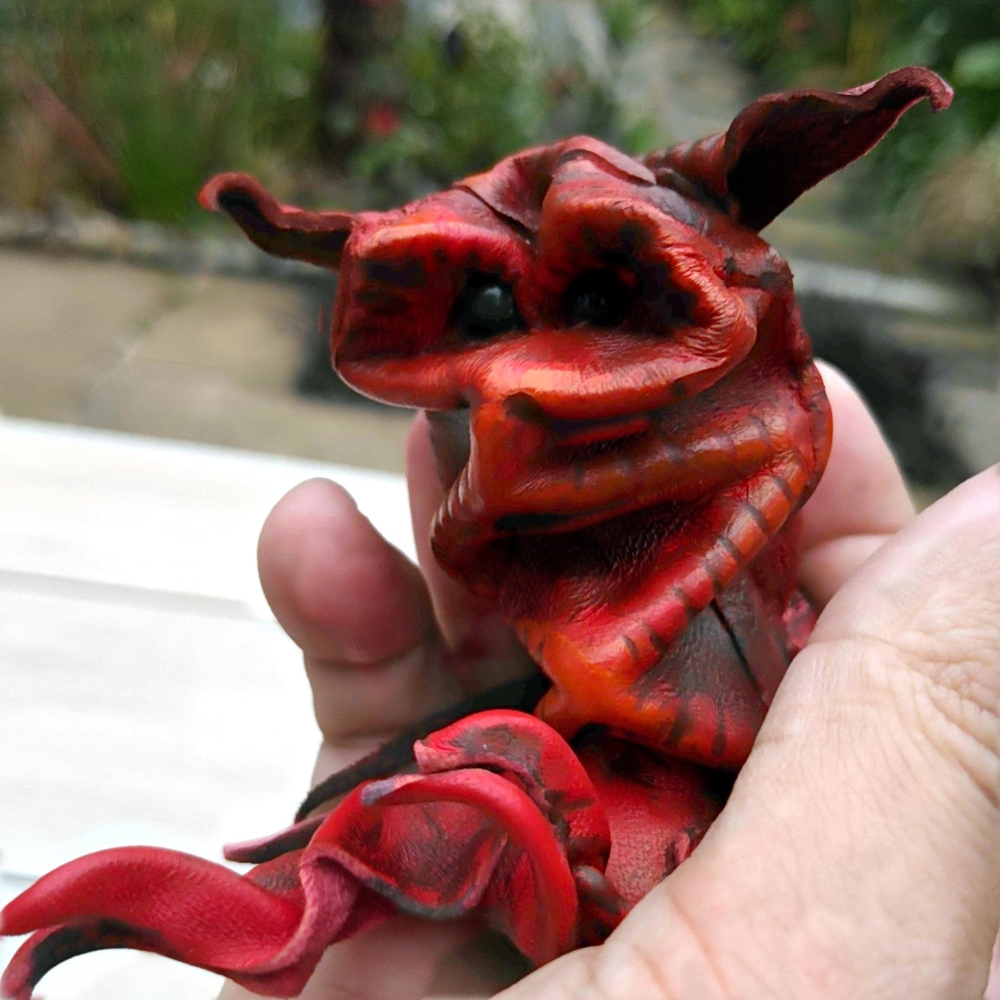 Cute red imp leather puppet
