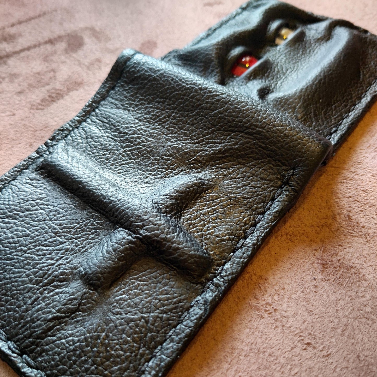 Chilled red white eyed horned monster face - demon eyes - Leather wallet.