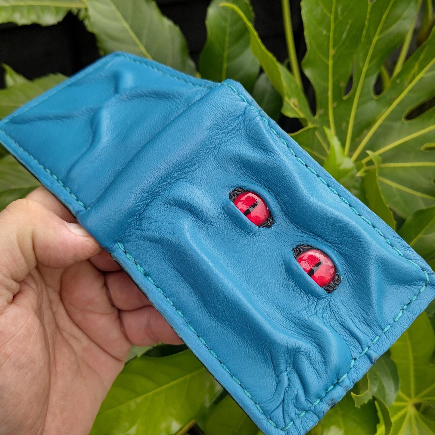 Red eyes - Teal Shmuggle face - Leather wallet