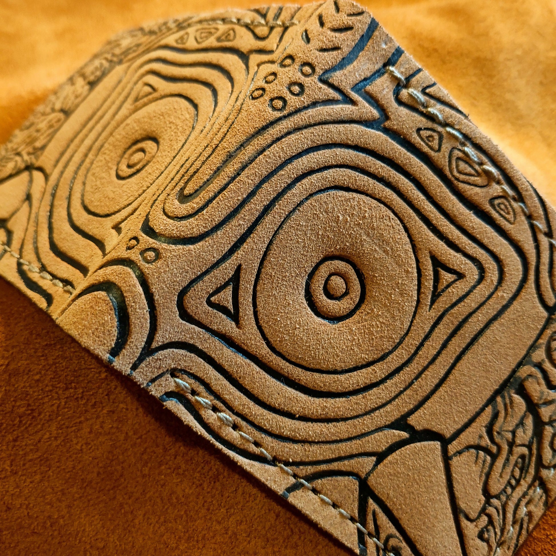 Suede Majoras Mask Leather wallet.