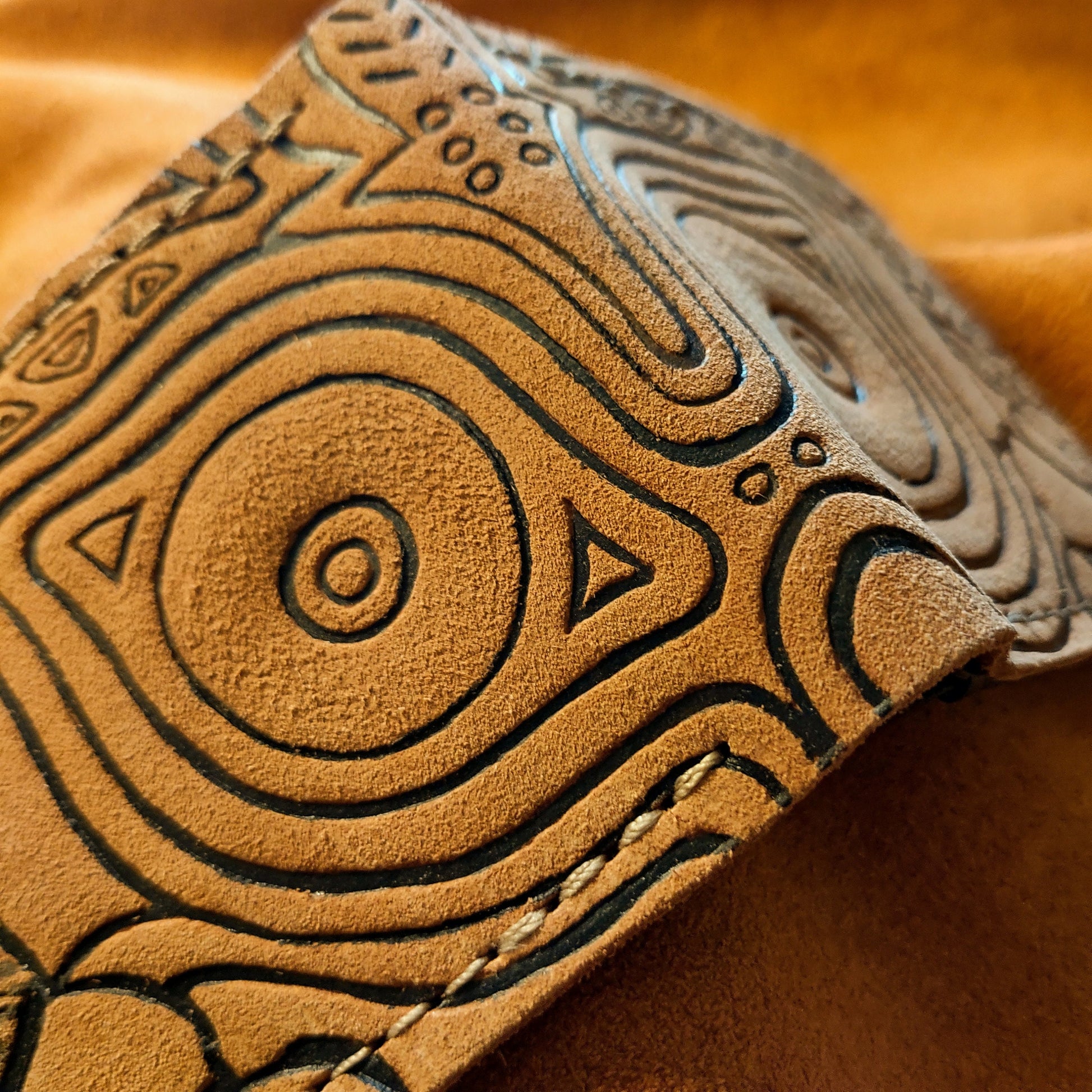 Suede Majoras Mask Leather wallet.