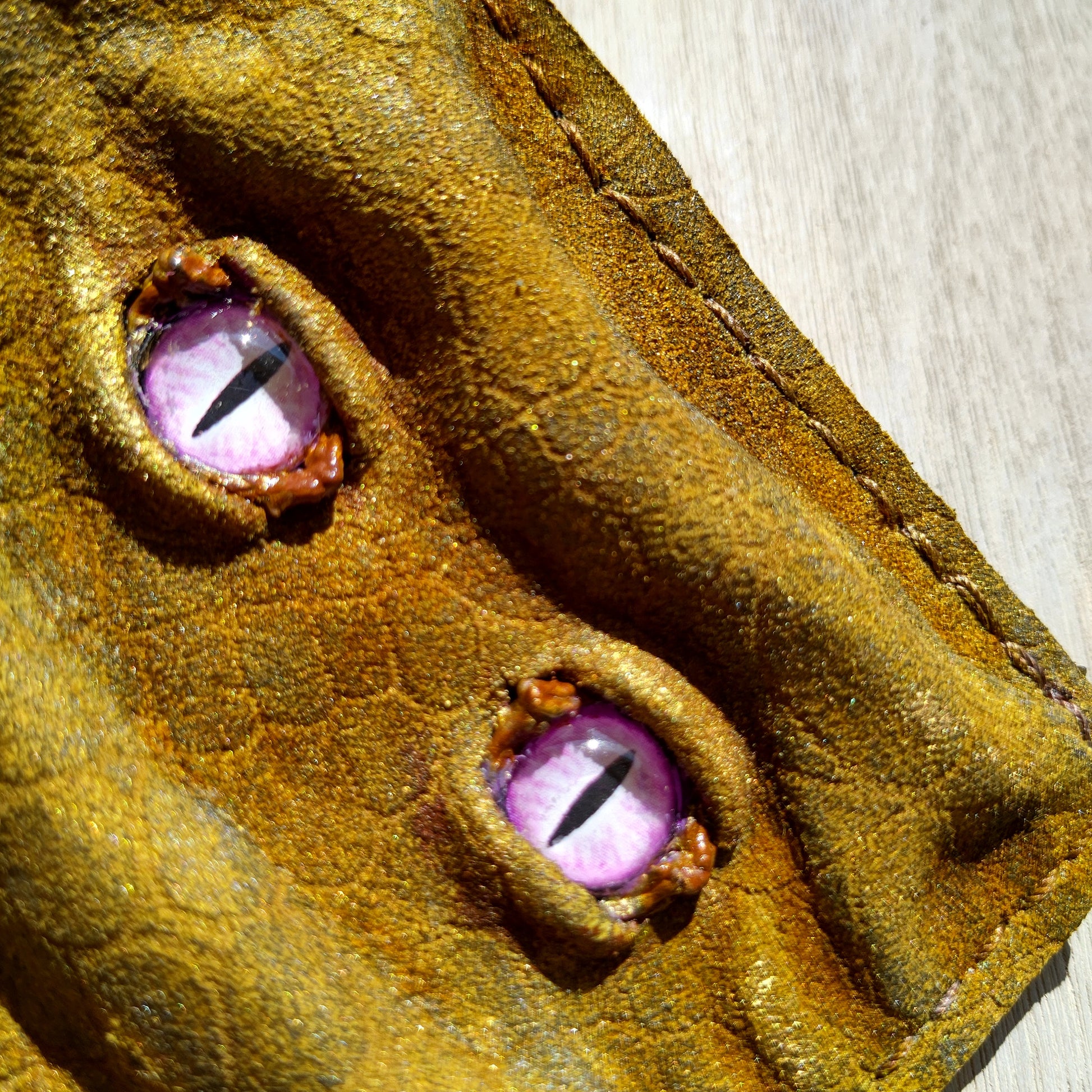 Enderman eyes - Golden Shmuggle face - Necromonicon - Pink demon eyes - Leather wallet.