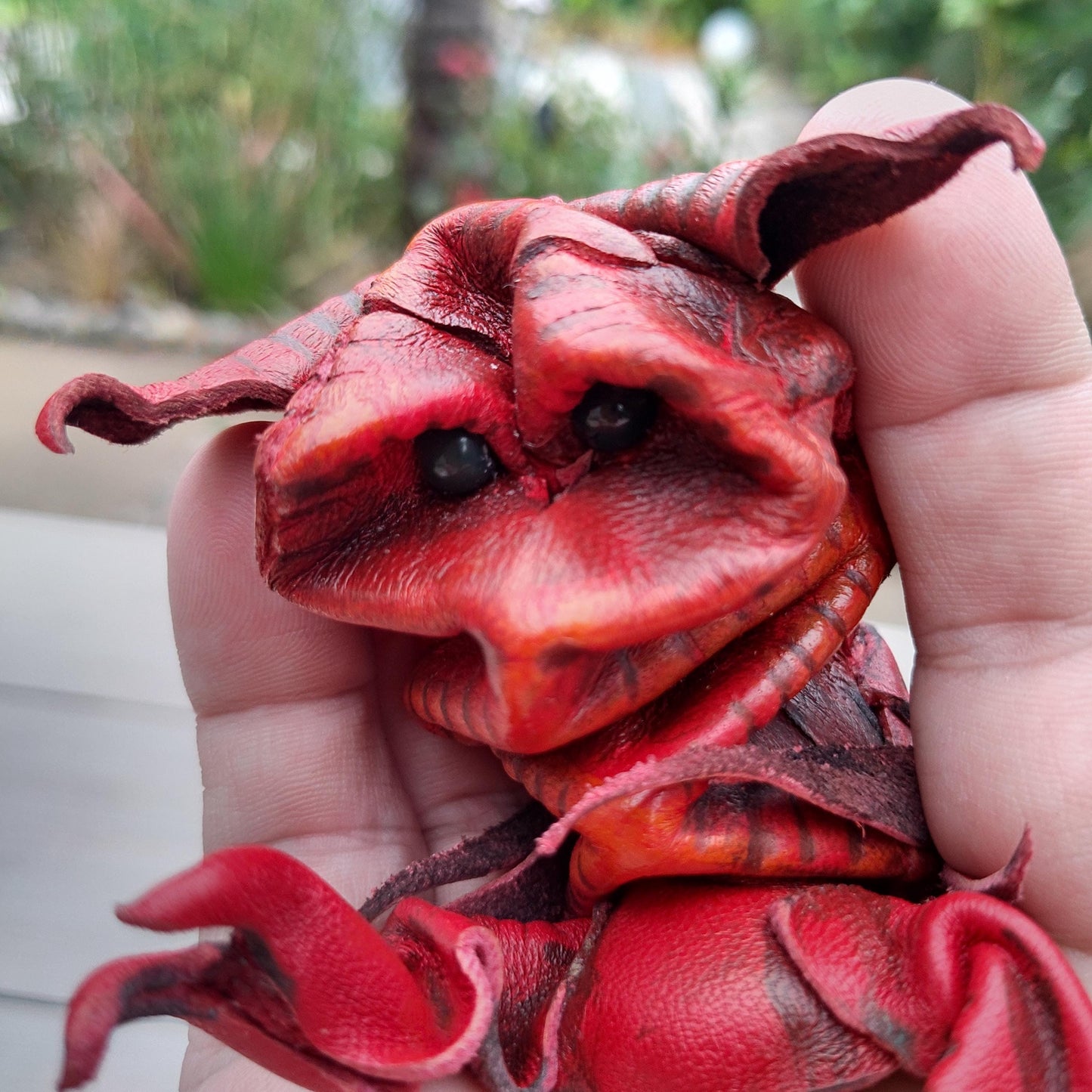 Cute red imp leather puppet
