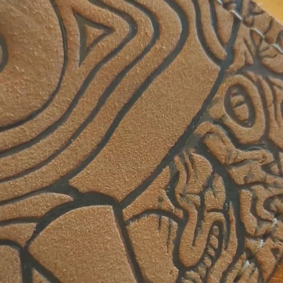 Suede Majoras Mask Leather wallet.