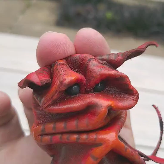 Cute red imp leather puppet