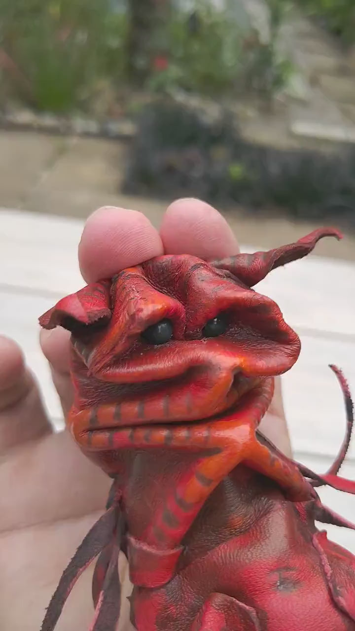 Cute red imp leather puppet