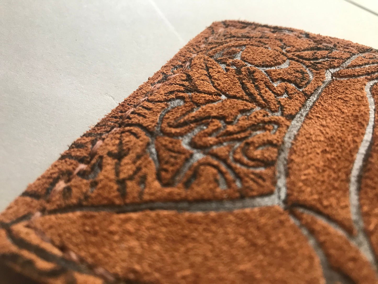 Suede Majoras Mask Leather wallet.